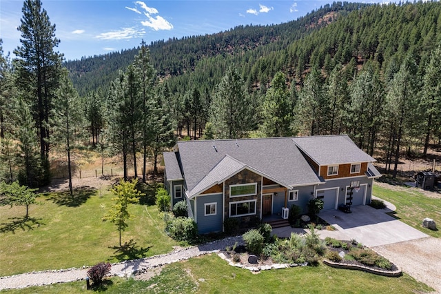 10758 Sleeman Creek Rd, Lolo, MT 59847 - aerial view of property and surrounding area with a heavily wooded area