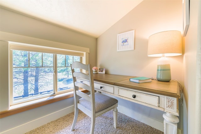 10758 Sleeman Creek Rd, Lolo, MT 59847 - carpeted home office with vaulted ceiling and baseboards