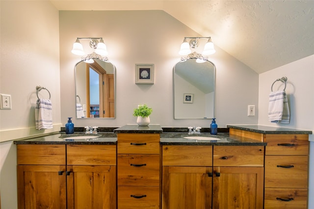 10758 Sleeman Creek Rd, Lolo, MT 59847 - full bathroom with vaulted ceiling and double vanity