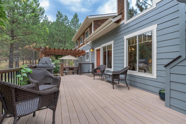 10758 Sleeman Creek Rd, Lolo, MT 59847 - wooden terrace featuring grilling area and a pergola