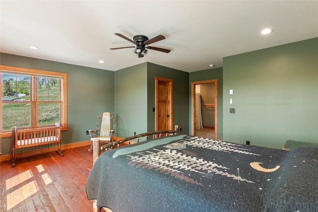 668 Dry Gulch Rd, Stevensville, MT 59870 - bedroom featuring hardwood / wood-style flooring, recessed lighting, baseboards, and ceiling fan