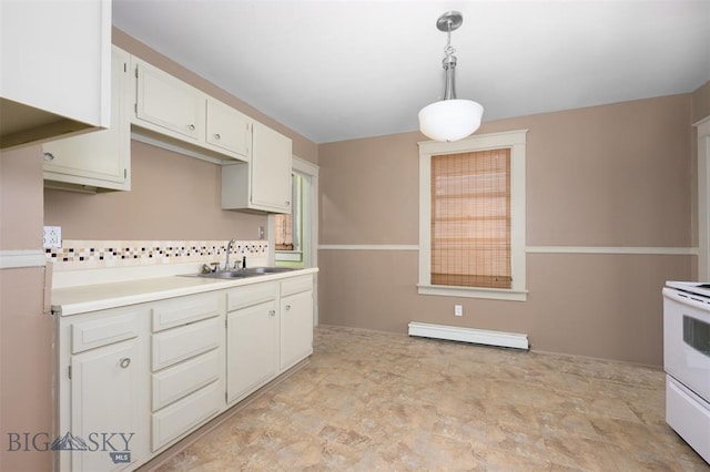 843 Lewisohn St, Butte, MT 59701 - kitchen with a sink, a baseboard heating unit, white range with electric stovetop, decorative backsplash, and light countertops