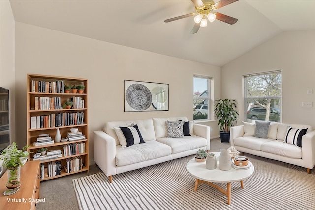 550 Green Tree Dr, Belgrade, MT 59714 - living area with carpet, vaulted ceiling, and ceiling fan