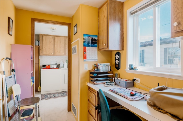 4242 Morningside Cir, Great Falls, MT 59405 - kitchen with separate washer and dryer, plenty of natural light, light countertops, and backsplash