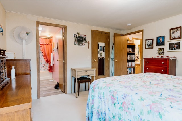 4242 Morningside Cir, Great Falls, MT 59405 - bedroom featuring crown molding, wood finished floors, and ensuite bathroom