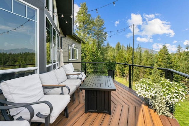 15 Sandi Ln, Heron, MT 59844 - wooden deck with an outdoor living space and a forest view