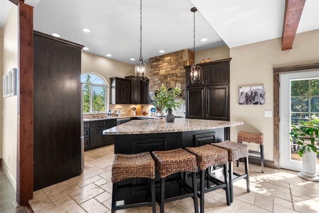 15 Sandi Ln, Heron, MT 59844 - kitchen featuring stone tile flooring, plenty of natural light, recessed lighting, baseboards, and beamed ceiling