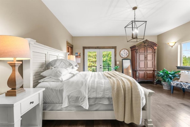 15 Sandi Ln, Heron, MT 59844 - bedroom featuring access to outside, french doors, multiple windows, and wood finished floors