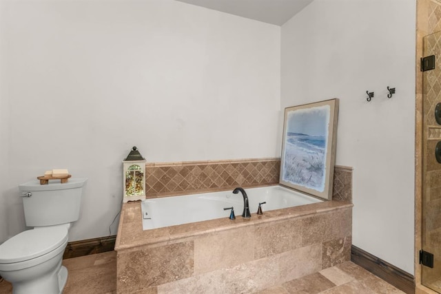 15 Sandi Ln, Heron, MT 59844 - bathroom featuring toilet, a bath, a shower stall, and baseboards