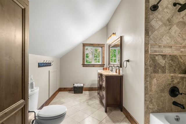 15 Sandi Ln, Heron, MT 59844 - full bathroom featuring vaulted ceiling, baseboards, vanity, toilet, and tile patterned flooring