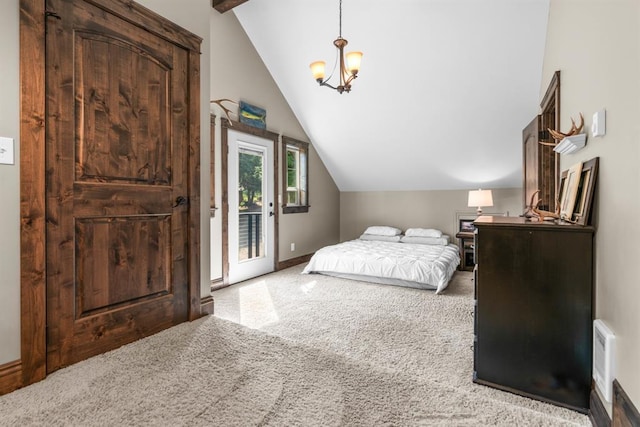 15 Sandi Ln, Heron, MT 59844 - bedroom with lofted ceiling, access to outside, carpet floors, a chandelier, and baseboards