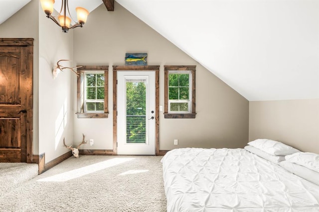 15 Sandi Ln, Heron, MT 59844 - bedroom with access to exterior, carpet, a chandelier, and baseboards