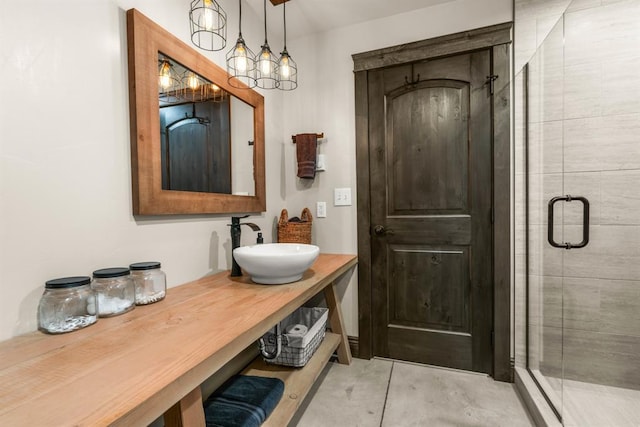 15 Sandi Ln, Heron, MT 59844 - bathroom with a stall shower, vanity, and concrete flooring
