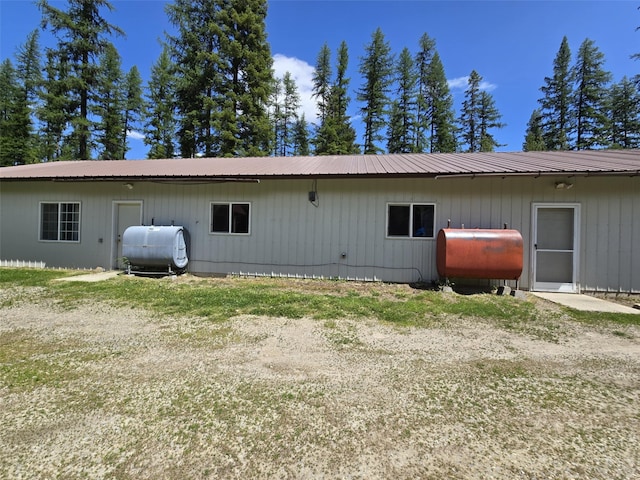 401 Western Larch Ln, Yaak, MT 59935 - rear view of house featuring heating fuel and metal roof