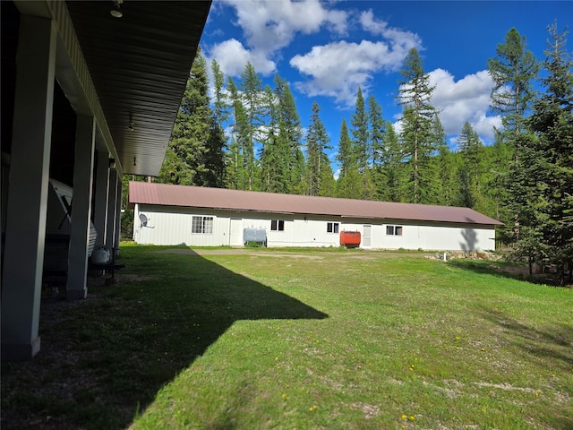 401 Western Larch Ln, Yaak, MT 59935 - back of house with a lawn