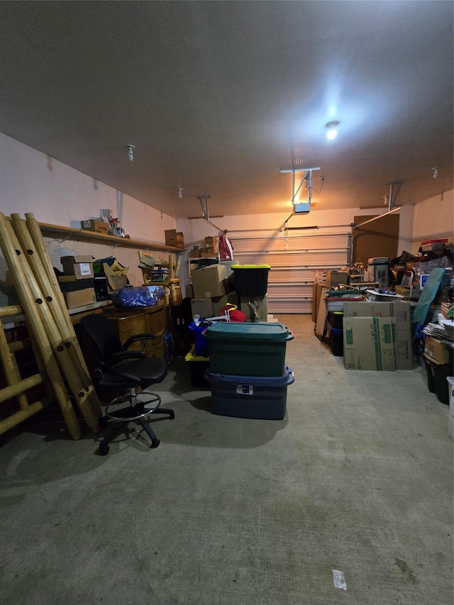 401 Western Larch Ln, Yaak, MT 59935 - garage featuring a garage door opener and a workshop area