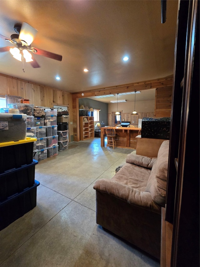 401 Western Larch Ln, Yaak, MT 59935 - living room with finished concrete flooring, ceiling fan, and recessed lighting