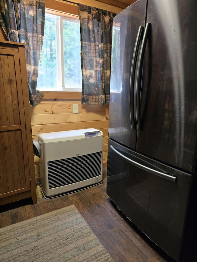401 Western Larch Ln, Yaak, MT 59935 - kitchen with freestanding refrigerator, heating unit, and dark wood-style floors