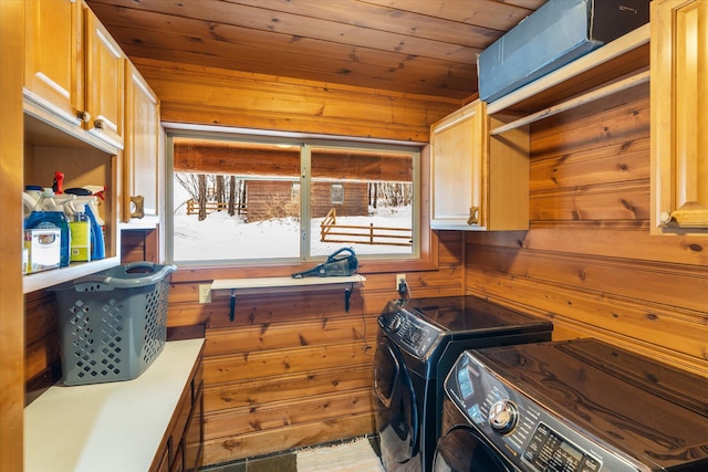 655 Leksand Trl, Whitefish, MT 59937 - laundry room featuring wood ceiling, washing machine and dryer, cabinet space, and wooden walls