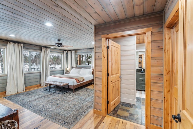 655 Leksand Trl, Whitefish, MT 59937 - bedroom featuring wood ceiling, multiple windows, recessed lighting, wood finished floors, and ornamental molding