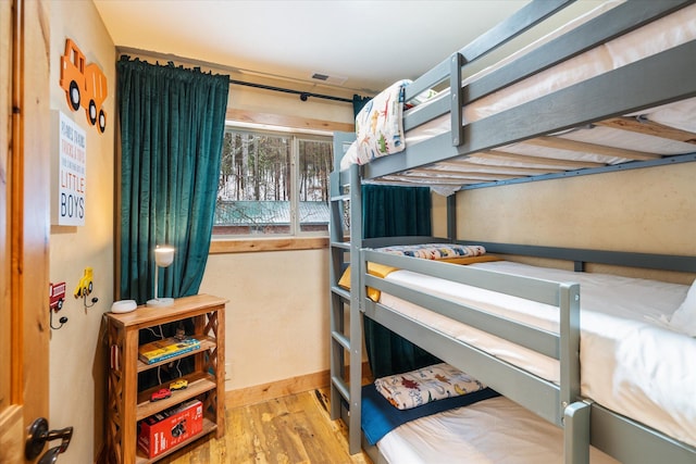 655 Leksand Trl, Whitefish, MT 59937 - bedroom featuring wood finished floors and baseboards