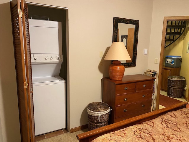97 Cedar Way Unit 97, Whitefish, MT 59937 - laundry area featuring stacked washer / dryer and baseboards