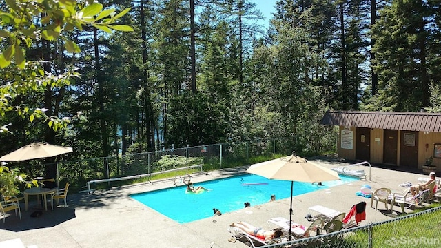 97 Cedar Way Unit 97, Whitefish, MT 59937 - community pool with a patio area and fence