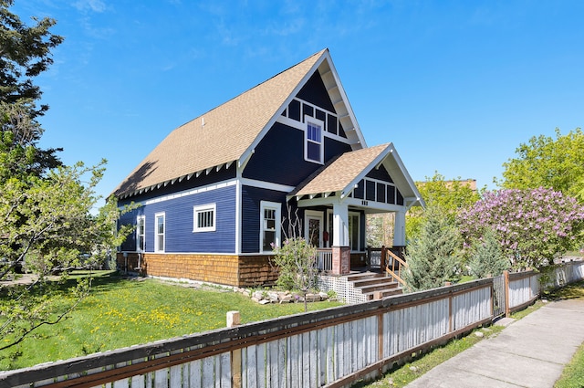 705 N 3rd St W, Missoula, MT 59802 - craftsman-style house with a shingled roof and covered porch