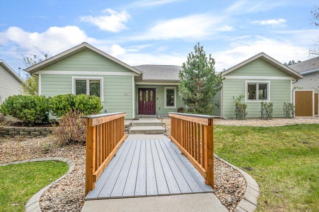 ranch-style house with a front lawn