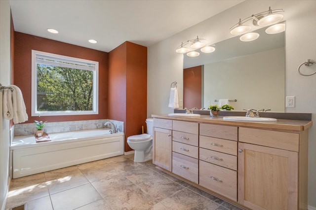 full bath featuring double vanity, a garden tub, and toilet