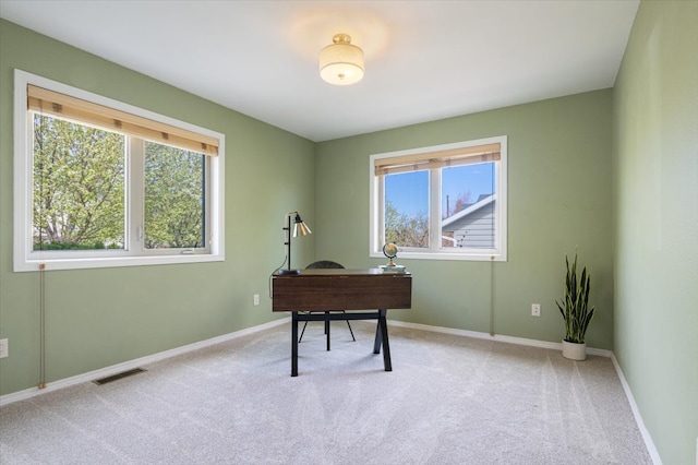 office featuring carpet floors and baseboards