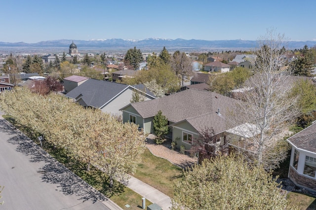 aerial perspective of suburban area with a mountain backdrop