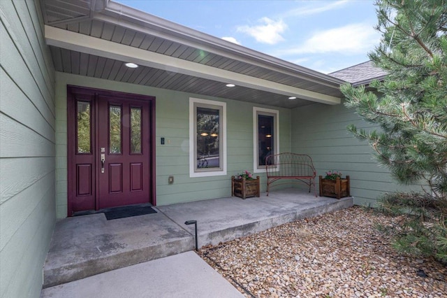 property entrance with covered porch