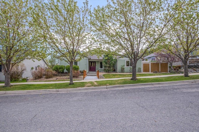 obstructed view of property featuring fence