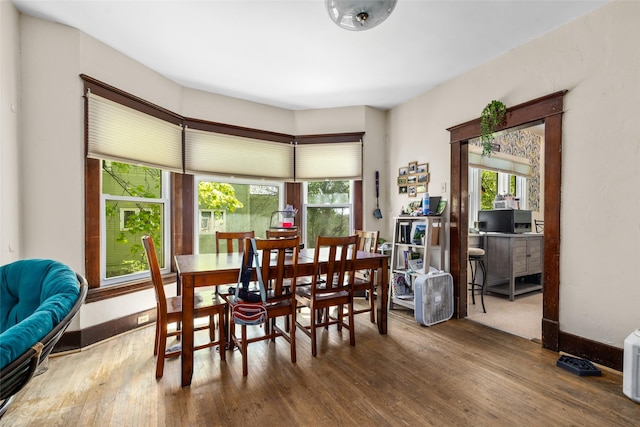 528 3rd Ave E, Kalispell, MT 59901 - dining space featuring wood finished floors, baseboards, and a desk