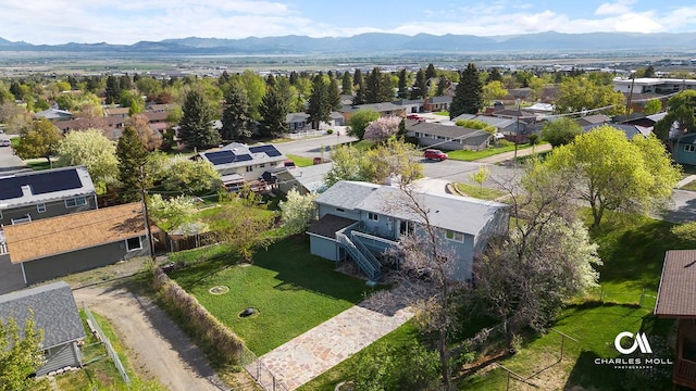 aerial perspective of suburban area featuring a mountain backdrop