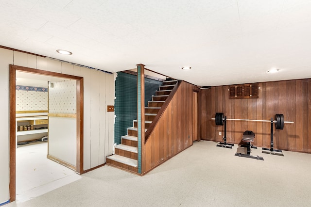 workout room with wood walls