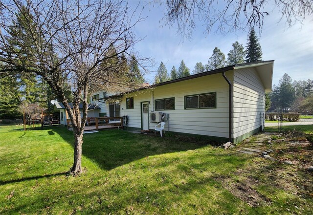 172 Scenery Rd, Libby, MT 59923 - view of front of property with a front lawn, a deck, and a cooling unit
