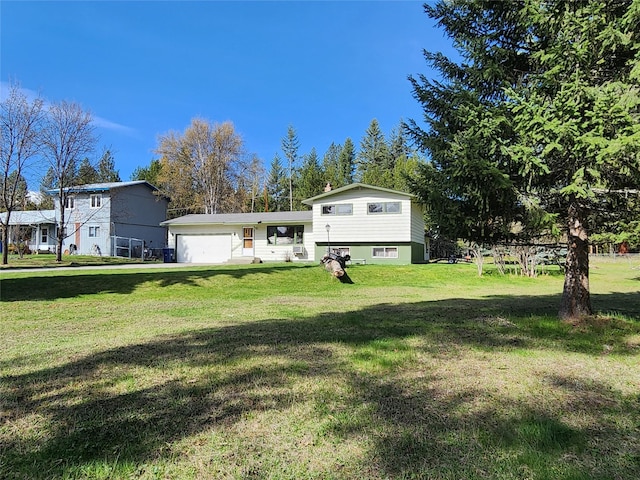 172 Scenery Rd, Libby, MT 59923 - view of front of house with a front yard and a garage