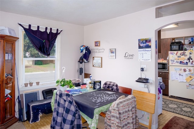 1005 Idaho Ave, Libby, MT 59923 - dining room featuring arched walkways
