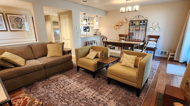 270 Bridge St Unit Qc1-103, Bigfork, MT 59911 - living room featuring hardwood / wood-style flooring and recessed lighting