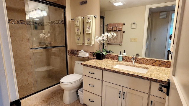 270 Bridge St Unit Qc1-103, Bigfork, MT 59911 - bathroom featuring a stall shower, vanity, and tile patterned flooring