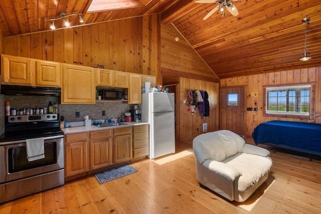 61253 Watson Rd, Saint Ignatius, MT 59865 - kitchen featuring freestanding refrigerator, electric stove, black microwave, under cabinet range hood, and wooden ceiling