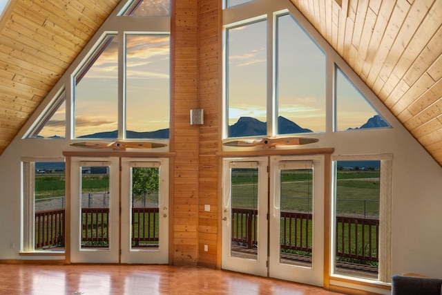 61253 Watson Rd, Saint Ignatius, MT 59865 - doorway to outside featuring wooden ceiling, wood finished floors, and high vaulted ceiling