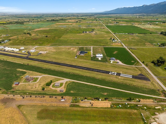 61253 Watson Rd, Saint Ignatius, MT 59865 - aerial view of property and surrounding area featuring rural landscape and a mountain backdrop