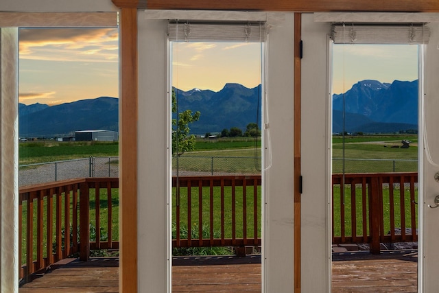61253 Watson Rd, Saint Ignatius, MT 59865 - doorway to outside featuring a mountain view and wood finished floors