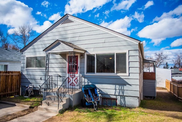 view of front of home with fence