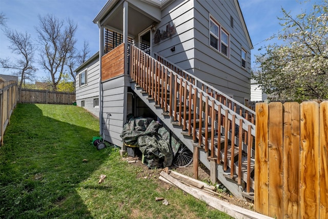view of side of home with stairway
