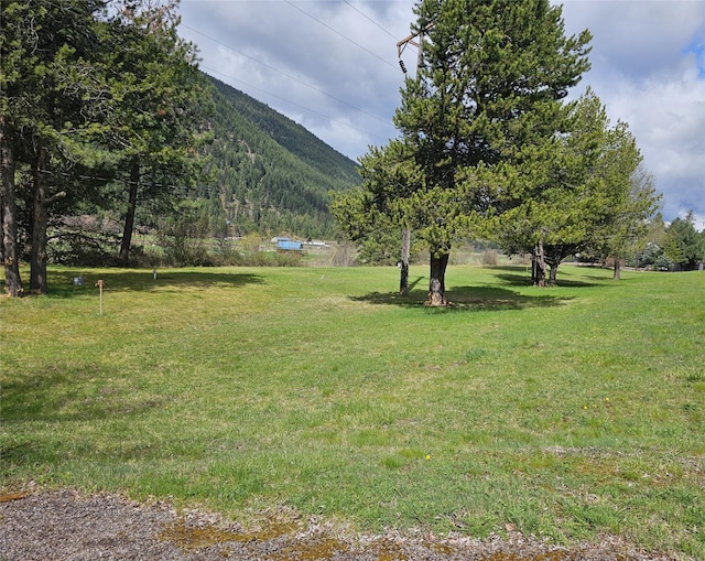 4743 Sloway Frontage Rd, Superior, MT 59872 - view of green lawn featuring a mountain view