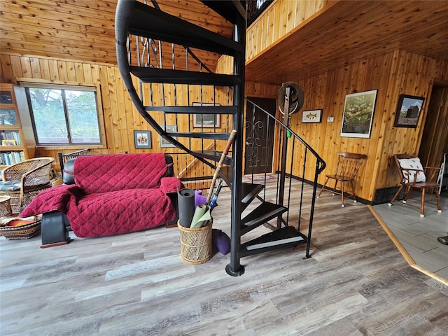 4743 Sloway Frontage Rd, Superior, MT 59872 - stairs with wood walls, wood finished floors, and lofted ceiling